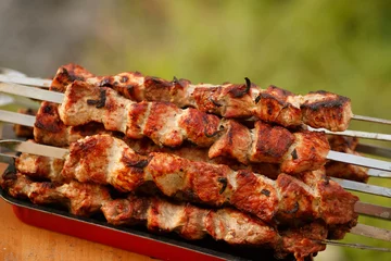 Gardinen Barbecue grilled pork shashlik meat © armina