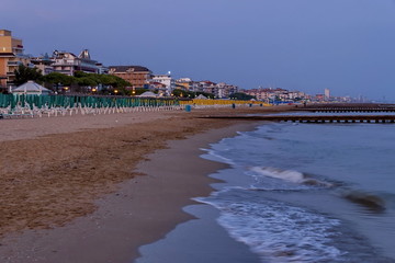 Sunset at beach of Lido di Jesolo, venetian Riviera, Italy