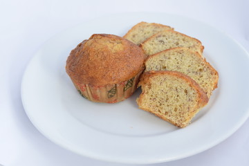 Banana cake on white plate