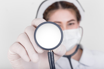 Beautiful nurse with a stethoscope