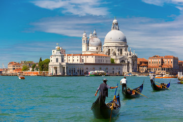 Fototapeta na wymiar Gondolas on Canal Grande in Venice, Italy