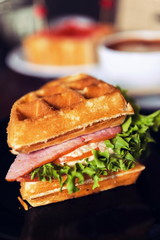 Ham and cheese sandwich served with hot coffee