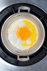 fried egg in the pan of thailand