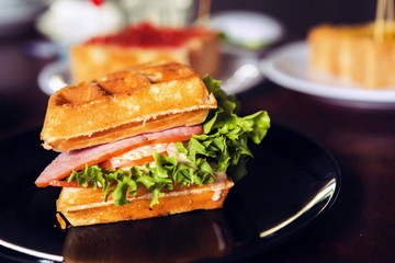 Ham and cheese sandwich served with hot coffee