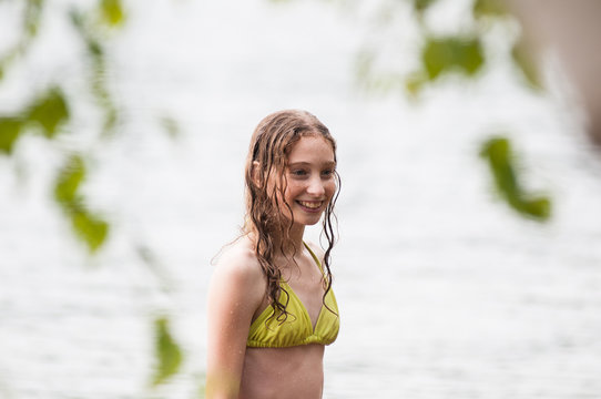 close up of a teenage girl at the beach on a summer evening