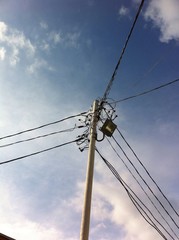 Power pole with wires - view from below