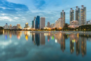 Cityscape at Bangkok Business District  twilight with water reflection Thailand