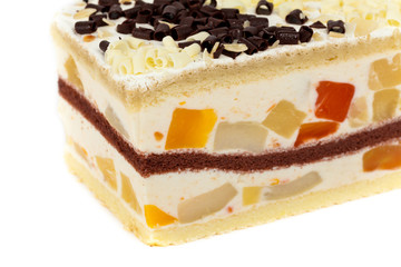 Fruit yogurt cheesecake on white background. Selective focus.