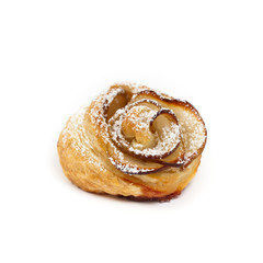 Pastry with apple shaped roses on white background. Macro. Selective focus.