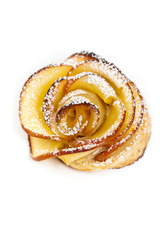 Pastry with apple shaped roses on white background. Macro. Selective focus.