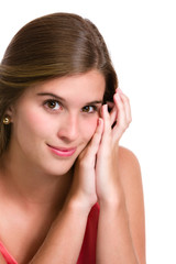 Fototapeta premium Smirking self confident Hispanic young woman with hands on chin.