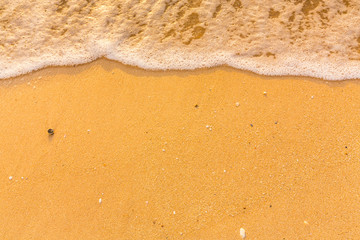 Sea wave on beach of tropical ocean.