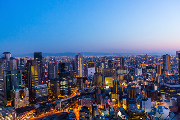 Osaka city view from high building at twilight.