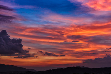 Fototapeta na wymiar Vibrant colors of a sunset or sunrise background