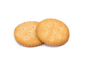 Round cracker biscuits on a over white background