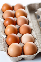 Shot of natural red eggs in retail package. Farm shots.