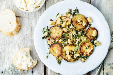 zucchini Basil mint cashews salad with ricotta and fresh bread