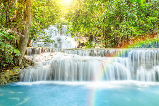 Beautiful waterfall with rainbow in deep forest, Thailand. © pushish images