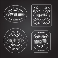  Vintage flower shop labels set. Vector design elements, business signs, logos,  labels, badges, stickers and other branding objects. White on blackboard