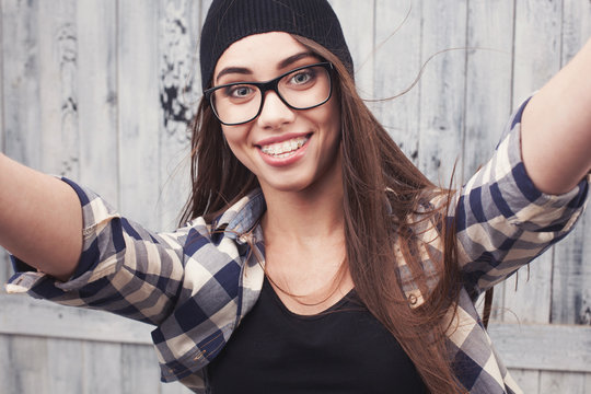 Hipster girl in glasses and braces 