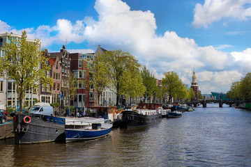 Fototapeta na wymiar Canal in the old city of Amsterdam, Netherlands