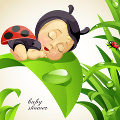 Newborn child dressed as ladybug