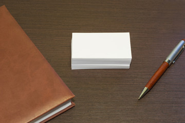 Blank business card with diary and pen