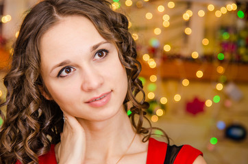 Portrait of girl on a background blurred lights