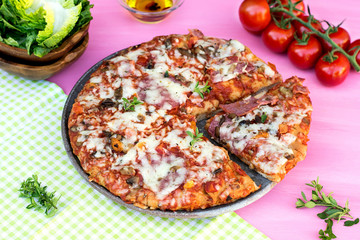 American style pizza with salami and mushrooms