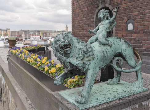 boy on a lion from Stockholm Town Hall