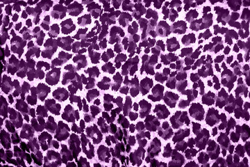 Obraz premium Beautiful purple leopard animal print fur background / wallpaper