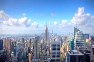 Wall murals Empire State Building Manhattan Skyline with a cloudy sky