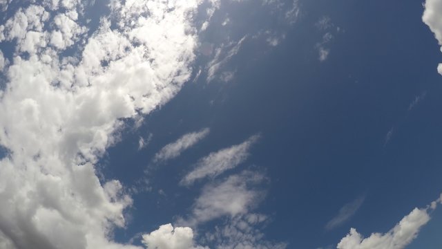 Rolling Clouds with Blue Sky