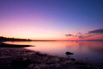 Fototapeta na wymiar stunning view of sunrise in maine over a calm lake