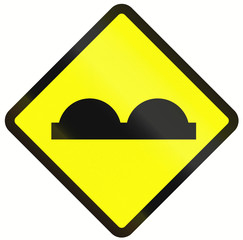 Indonesian road warning sign: Rough road