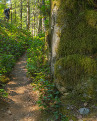 Hiker Climbs Granite Boulders