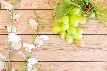Portion of fresh Green Grapes on vintage wooden background