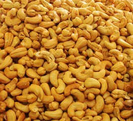 Cashew nuts closeup food background.