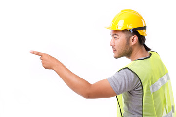 construction worker pointing sideway to blank space