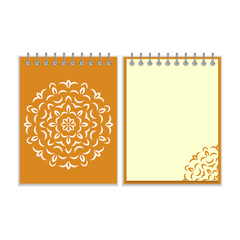 Spiral orange cover notebook with round ornate pattern
