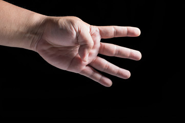 hand on black background with difference act