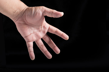 hand on black background with difference act
