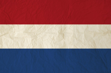 Flag of the Netherlands with vintage old paper
