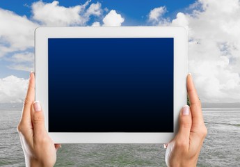 Tablet, hand, phone.