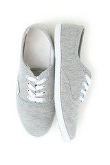 Pair of grey shoes isolated on white