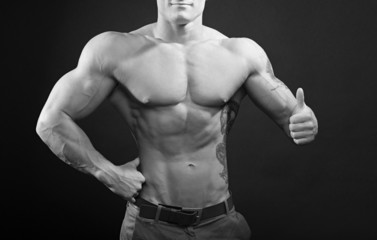 strong man showing thumbs up