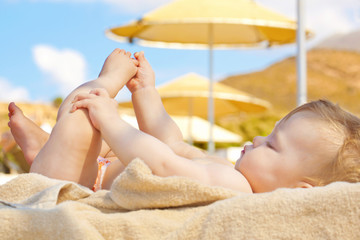 Summer concept. Happy baby on beach. © Vitalinka