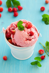 Homemade ice cream with wild strawberry.