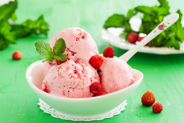 Homemade ice cream with wild strawberry.