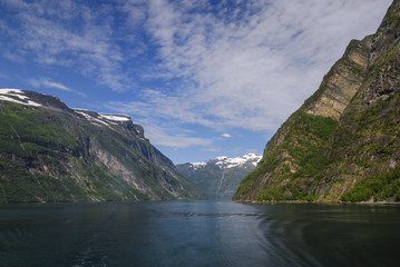 Low angle shot from within geirangerfjord on a sunny day.